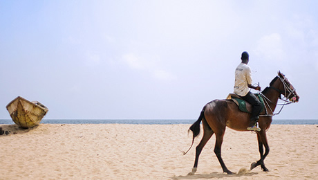 Horse back riding on one of Lagos many serene beaches